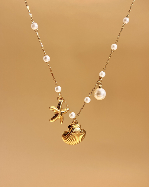 Collier Charms Étoile de Mer et Coquillage avec Perles